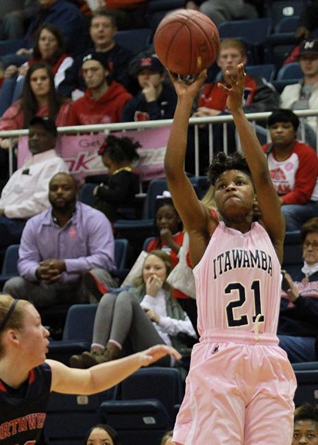 Jayla Chills (21) shoots over a Northwest defender for three of her 28 points Monday night. (Lee Adams/ICCImages.com)