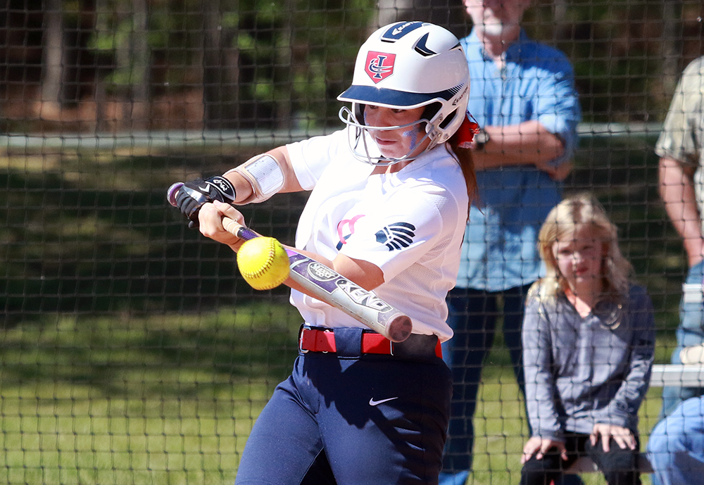 Timely hits gives Softball game one win